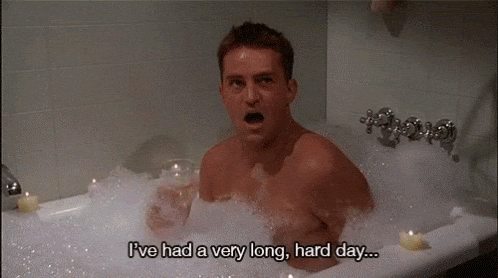 GIF of Chandler Bing in a bubble bath with caption "I've had a very long, hard day"