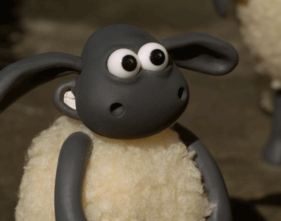 GIF of Shaun the sheep smiling and giving two thumbs up