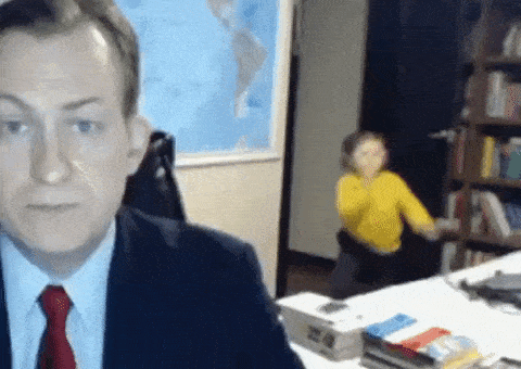 GIF of toddler interrupting TV news interview being held at home